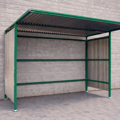 Green Traditional Cycle Shelter Open-Back against a wall